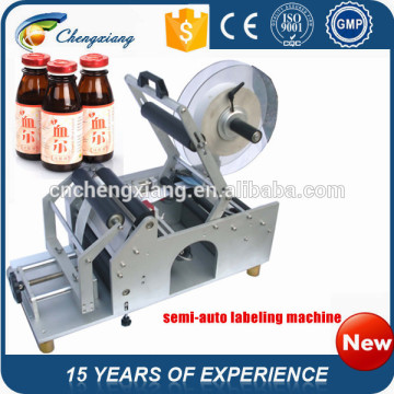 Hot sale semi automatic bottle label applicator,wine bottle label applicator,round bottle label applicator manual