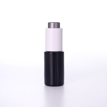 Schwarze Glasflasche mit Push-Knopf-Pipette