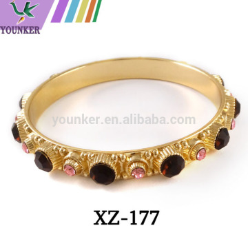 gold crystal or silver bracelet and bangle