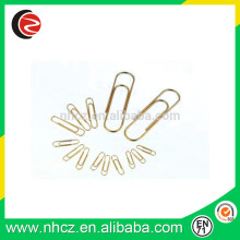 golden paper clip , plain shape
