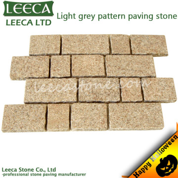 Light grey tumble sawn pattern granite paving stone