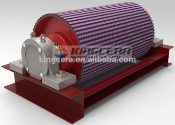 Ceramic drum lining for conveyor system