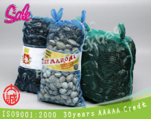 purple plastic leno net potato sack with label for fruits and vegetables