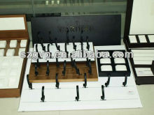 wooden display wrapped with LEATER