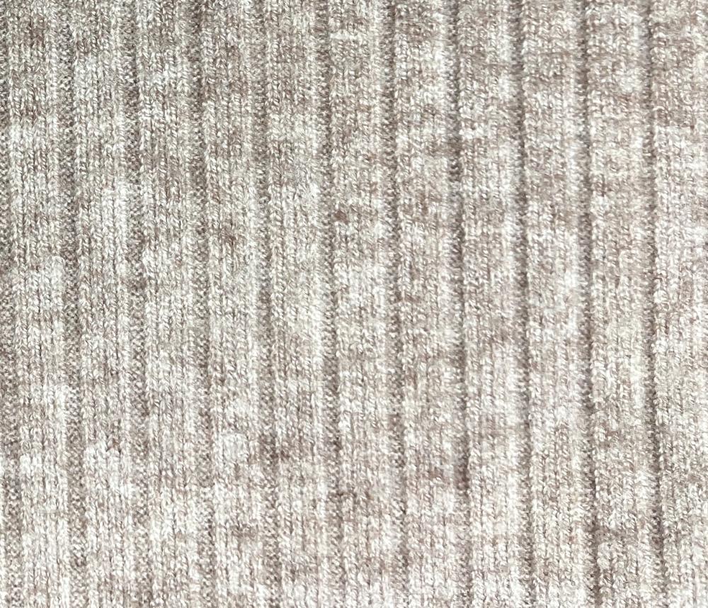 45% Rayon 26% Polyester 20% Nylon 9% Spandex Rib Fabric