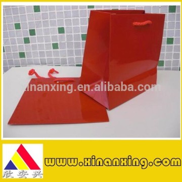 red paper bag with glossy lamination