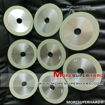 Ceramic diamond bruting wheel