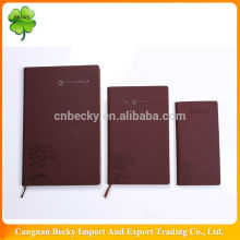 2015 China dark red folk tree embossing logo insurance business gift pu leather diary in a7/a6/a5 with line printing