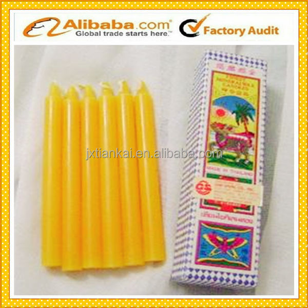 yellow taper religious  church  beewax candle