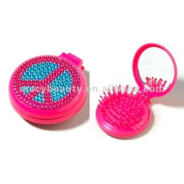 Crystal pop up brush with mirror