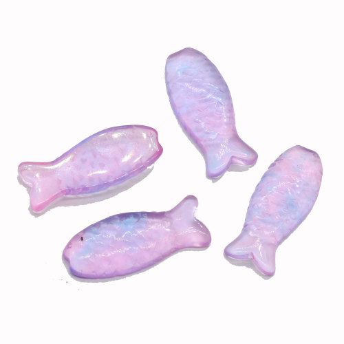 Nouveaux charmes 100 pièces / sac Mini poisson Transparent dos plat résine Cabochon pour téléphone fait à la main coquille perles charmes enfants jouet décor