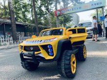 Yellow children electric car