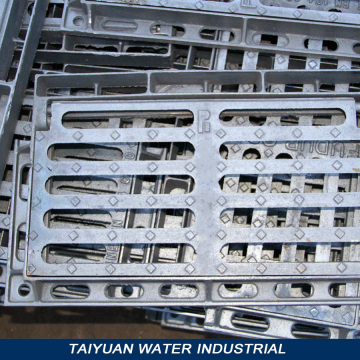 Trap floor ductile iron grating