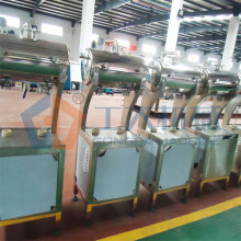 Bottle filling machine with double head