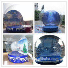 human snow globe, giant inflatable snow globe, inflatable giant globe ball