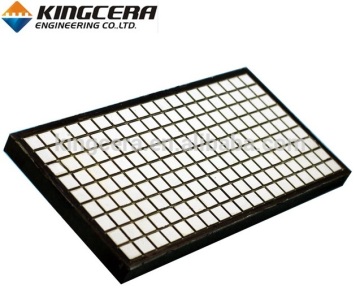 Ceramic rubber composite wear plate backed with steel panel