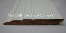 white solid wood wall baseboard
