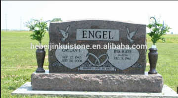 dark red granite tombstone