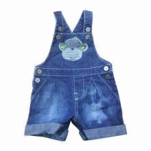 Boy's denim dungaree, cartoon monkey face in center front, bottoms up
