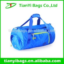 Travel rolling duffel bag with shoe compartment