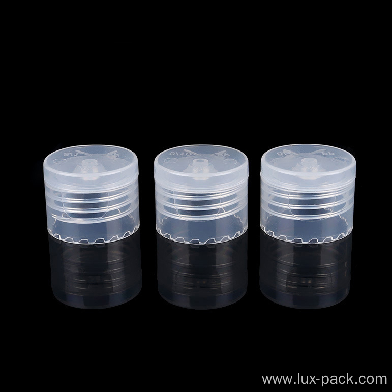 smooth ribbed flip top cap disc top cap