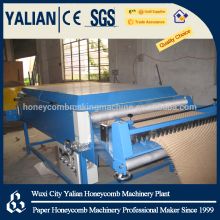 Honeycomb paper core expanding machine with cutter inside