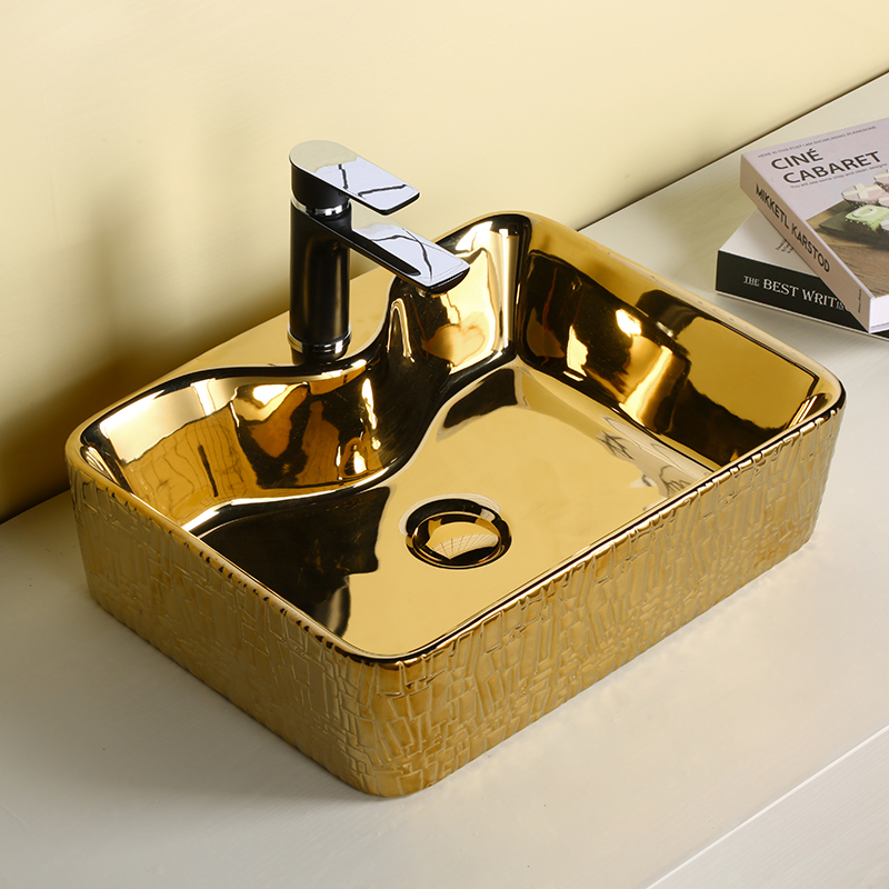 Lavabo redondo de baño mayorista de cerámica de lujo de color dorado y negro con lavabo de encimera nuevo diseño de lavabo de arte