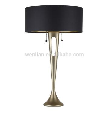Brass table lamp for hotel guestroom