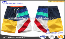 2016 Men's colorful beach shorts. Bathing suits.