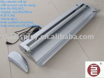 Electric scrolling roll up stand