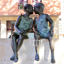 Garden outdoor love bronze boy and girl sitting on bench sculpture