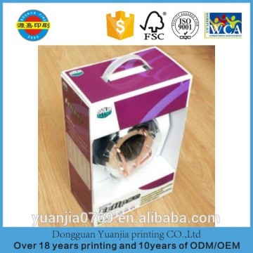 Corrugated packaging box with plastic handle