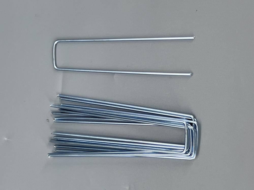 Galvanized U-shaped ground nails for weeds