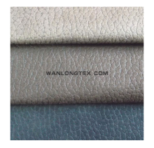 Embossed suede for upholstery