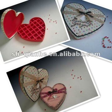 Heart-shape candies box with plastic tray