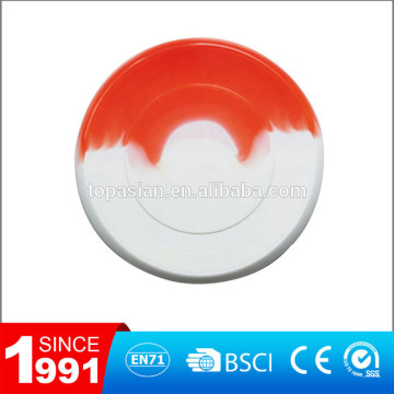 red frisbee/rubber dog frisbee/rubber frisbee