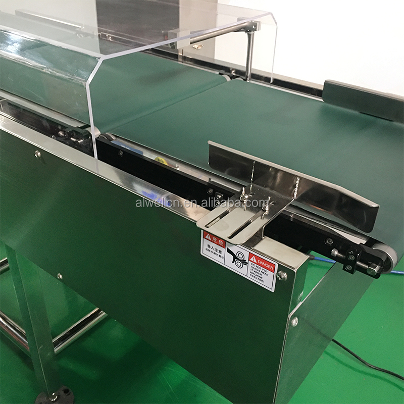 Conveyor check weighers with pusher rejector