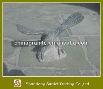 hand carved stone eagles carving