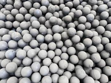 A ball mill grinds steel balls