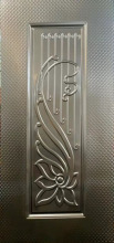 Decorative embossed metal panel