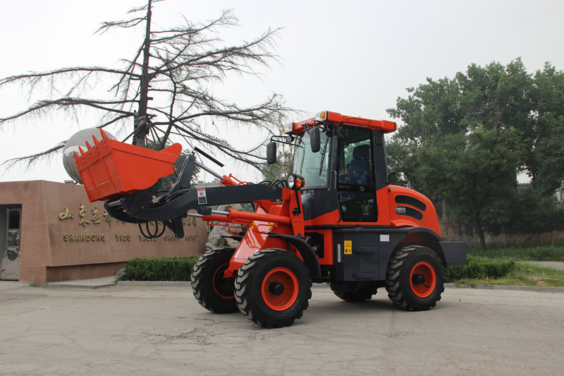 mini wheel loader OCL15 dengan kapasitas 1.5 ton