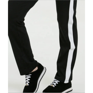 Pantaloni con pannello laterale a contrasto bianco e nero