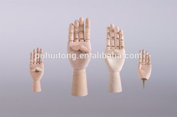 Articulated wood hand/wood hand for window display