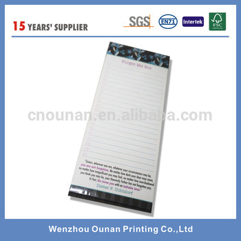 Manufactured fridge magnetic note pad on fridge