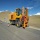 Highway guardrail piling machine