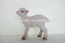 White and black standing resin sheep