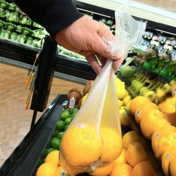 Прозрачный плоский полиэтиленовый пакет в рулоне для пищевых продуктов