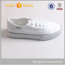 Lace-up white brand canvas shoes