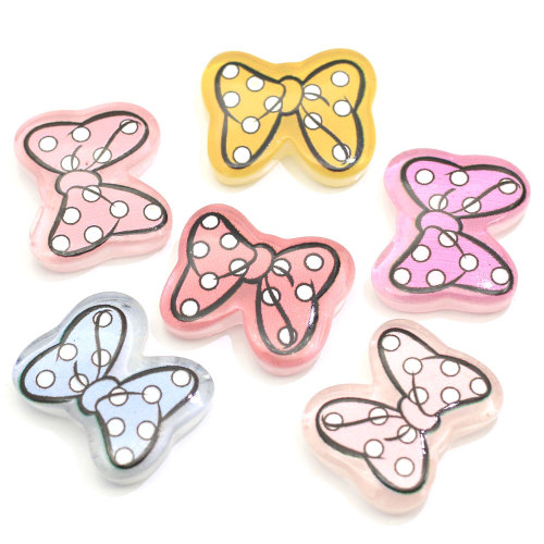 Offre spéciale coloré Bowknot en forme de résine Cabochon dos plat perles pour artisanat fait à la main décor Slime décor perle