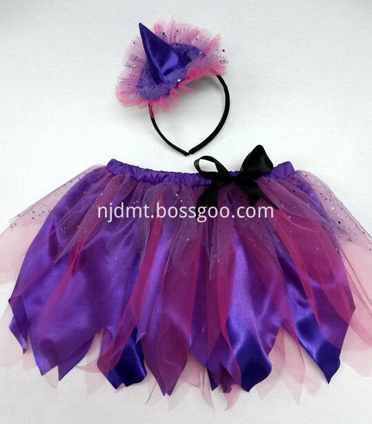 A purple skirt with a headband